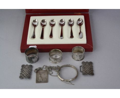 A CASED SET OF SIX ROBBE & BERKING SILVER SPOONS, approximately 3.2ozt, three silver napkin rings one inscribed K Taylor, one