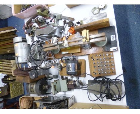 A COLLECTION OF ELECTRICAL WATCH/CLOCKMAKERS TOOLS, etc, including a lathe with accessories, collets, foot control, polishing