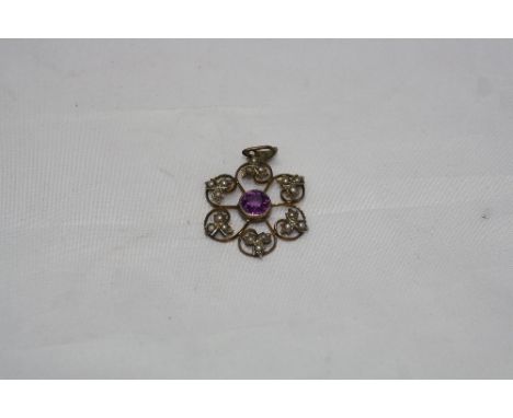 AN EDWARDIAN 9CT AMETHYST AND SEED PEARL PENDANT