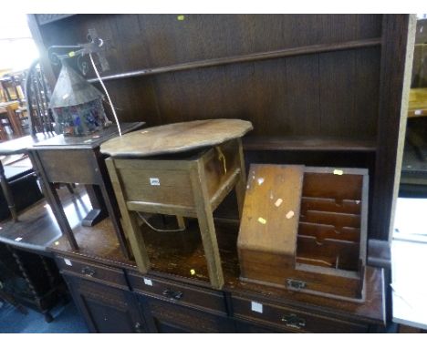 A VICTORIAN DISTRESSED DESK ORGANISER, (distressed, missing one door), two oak sewing boxes and a wall hanging lantern (sd) (