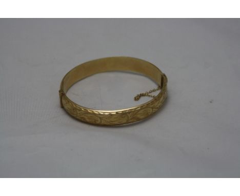 A 9CT BANGLE, approximate weight 12.9 grams