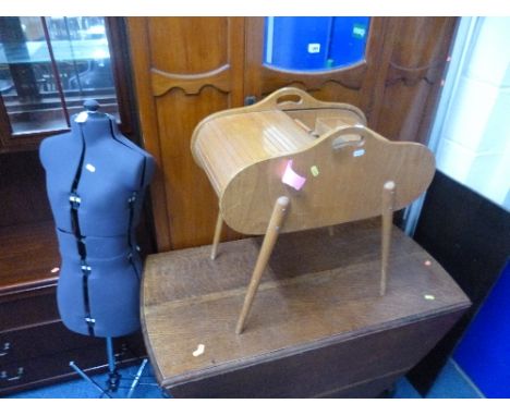 A TEAK SEWING BOX WITH ROLL TOP, supported on tapering legs and a dress mannequin (2)