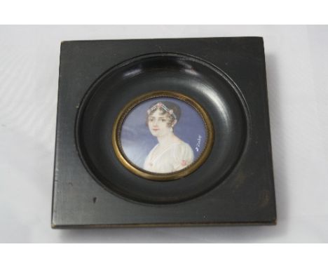 A MINIATURE PAINTED PORTRAIT OF A LADY