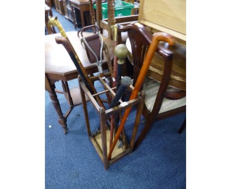 AN OAK STICK STAND, containing various walking sticks, etc (9)