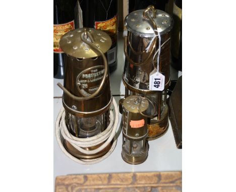 A 'THE PROTECTOR' MINING LAMP, converted to electricty, A Type 6, 1636 Protector lamp and a miniature lamp (3)