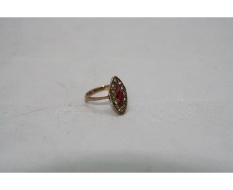 A 9CT VICTORIAN MARQUISE SHAPED RUBY AND SEED PEARL RING, ring size H