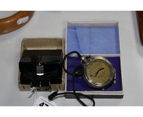 A BOXED MILITARY COMPASS, magnetic marching MK1 and a hand-held Voltmeter (2)