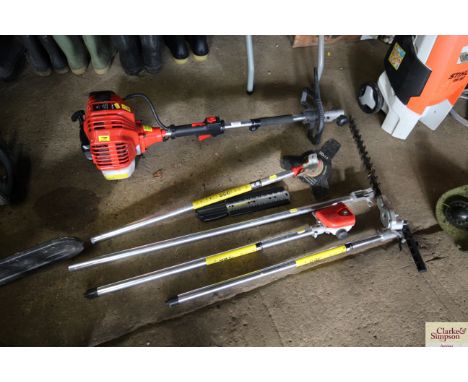 A Bu-Ko Power 5200 brush cutter with extension poles; brush cutter head; chainsaw head; hedge trimmer attachment etc.