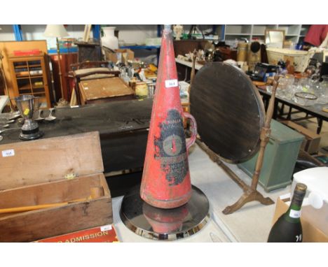 A fire extinguisher with base for conversion to a lamp AF