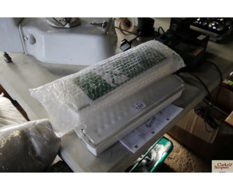 Three LED light fixtures