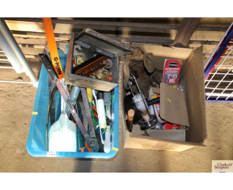 A plastic box with contents of various garden tools and a cardboard box containing a bag of spanners etc.
