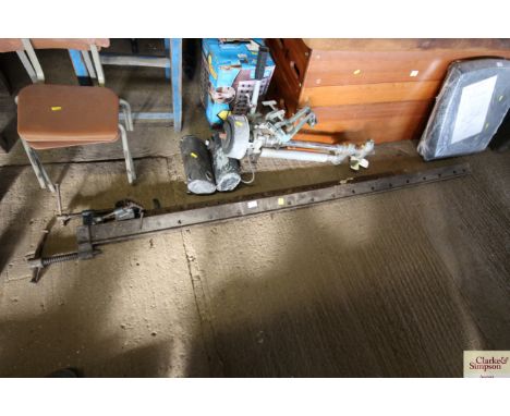 A large sash clamp and another smaller