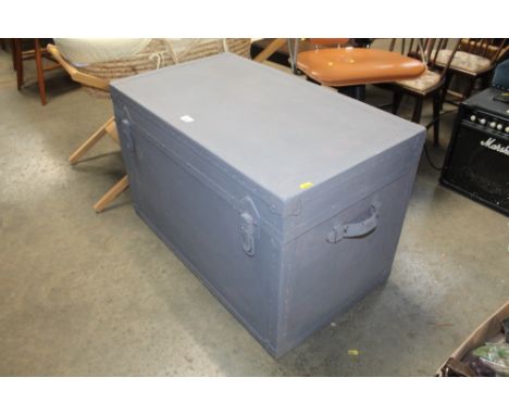 A grey painted trunk