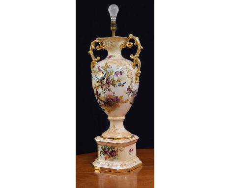 A large Staffordshire pottery baluster table lamp,&nbsp;transfer printed with birds and flowers on a&nbsp;blush ivory ground 