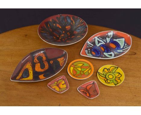 Two Poole Pottery teardrop shape 91 plates, both with factory stamps to the underside, 12" x 8"; also a Poole Pottery shape 5
