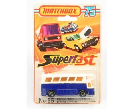 Matchbox Superfast 65b Airport Coach - metallic dark blue body, light amber windows, pale yellow interior, bare metal base wi