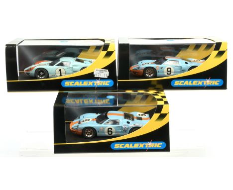Slot cars - Scalextric Ford GT Group to include, C2403 Ford GT40 1968 Race No.9, C2404 Ford GT40 1969 Race No.6, C2464 Ford G