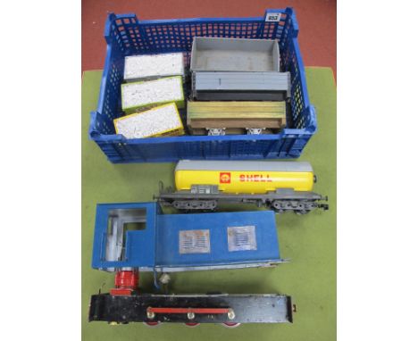 Seven 'O' Gauge/7mm Unboxed Items of Rolling Stock, a Lima bogie Shell tank wagon, three Lima four wheel ore wagons with Lime