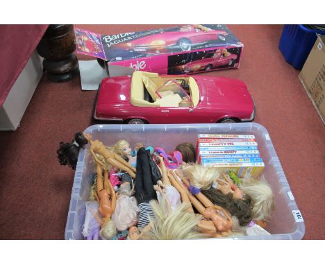 A Mattel Barbie Jaguar XJS V12, with instruction leaflet, boxed, together with a quantity of dolls, clothing, Barbie and simi