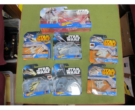 Seven Hotwheels Star Wars Diecast Model Space Vehicle Packs, to include AT-AT vs Rebel Snowspeeder, Y-Wing Fighter, Ghost, Ti
