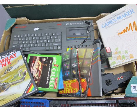 A Sinclair 128K ZX Spectrum +2 Home Computer, with built in datacorder, joysticks, instruction manual; together with a quanti