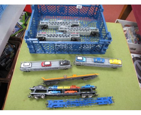 Six Triang 'OO' Guage/4mm Unboxed Car Transporters (plus three cars), plus a Lima example with six cars, a Hornby 'Tierwag' (
