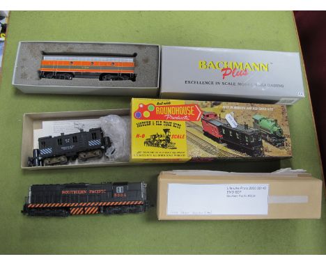 Three "HO" Gauge U.S.A Outline Boxed Diesel Locomotives, (good, U/T), a Roundhouse Ref No. 2800 Track Cleaner (with spare pad