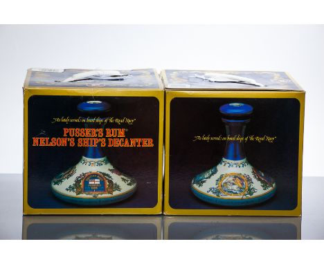 PUSSER'S RUM NELSON'S SHIP'S DECANTER (2) Navy Rum in ceramic ship's decanter. 1 L, 54.5% volume, in presentation box. 2 bott