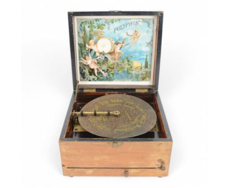 German-late 19th century "Polyphon" musical box in a mahogany and ebonised case, with winding lever, stop/start lever and rep