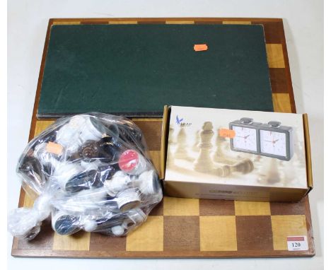 A modern chess set and board, with chess time clock