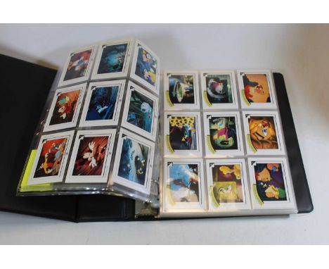 An album of Disney collectors cards, to include Garfield, Get Goofy, Family Portrait, and Favourite Stories etc.Condition rep