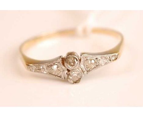 An Art Deco 18ct gold and platinum diamond set dress ring, 2g, size S