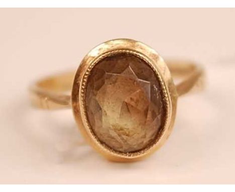 A 9ct gold and smoky quartz set dress ring, 3.3g, size N/O