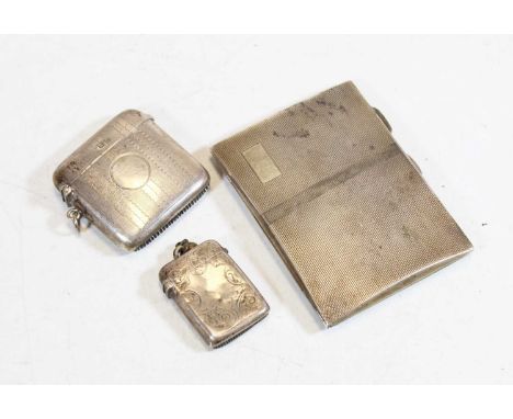 A 1930s lady's silver pocket cigarette case, having engine turned decoration; together with a late Victorian silver vesta; an