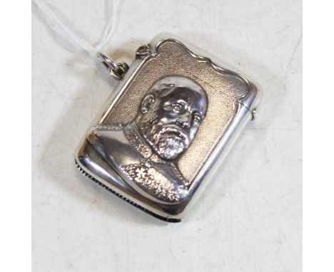 An Edwardian silver vesta to commemorate the coronation of King Edward VII, of hinged rectangular form, relief decorated with