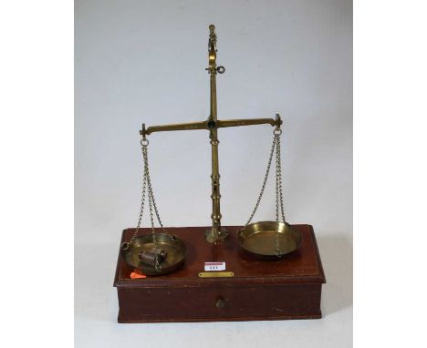 An early 20th century brass beam scale, h.44cm