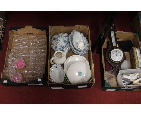 Three boxes of miscellaneous items, to include early 20th century carved oak cased barometer, loose flatware, cut glassware, 