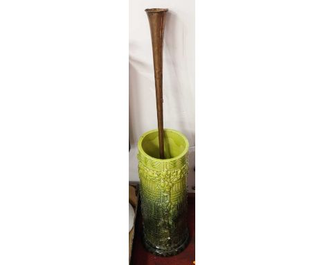 A late Victorian Burmantofts faience green glazed pottery stick-stand, relief decorated with leaves, having basket weave type