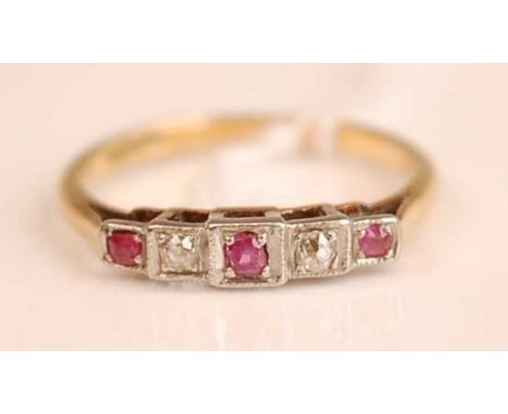 An Art Deco 18ct gold and platinum ruby diamond dress ring, 2.7g, size M/N