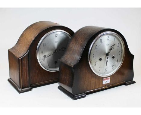 An early 20th century oak cased Smiths eight-day mantel clock, h.22cm; together with a similar example (2)