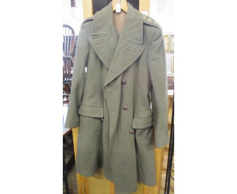 An Army issue green long coat, together with a Harrods morning suit