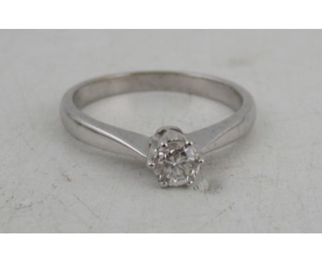 A modern 18ct white gold solitaire diamond ring, weight 3g, diamond approximately 0.25ct, colour J/K , clarity VS1/VS2, ring 