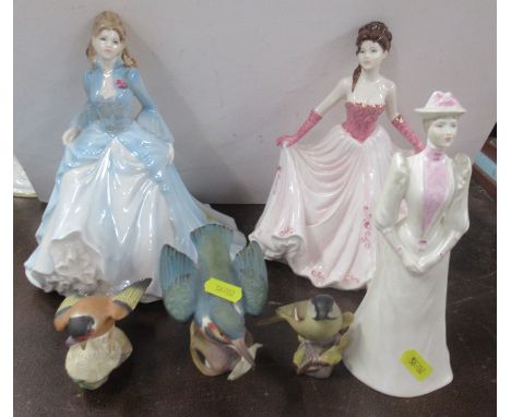 Three porcelain figures and the Royal Worcester birds