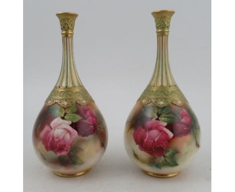 A pair of Royal Worcester vases, decorated with roses by Lander and Hood, shape number H103, height 9insCondition Report:  Po