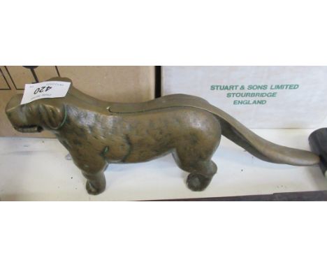 A novelty dog nut cracker
