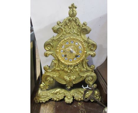 A French gilt metal cased mantel clock, height 11.5ins