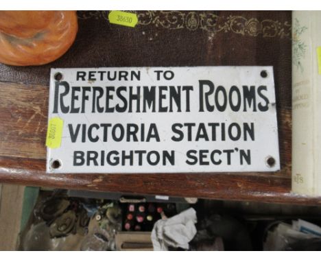 A small enamel sign