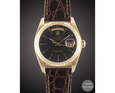 A GENTLEMAN'S 18K SOLID YELLOW GOLD ROLEX OYSTER PERPETUAL DAY DATE PRESIDENT WRIST WATCH
CIRCA 1978, REF. 18038 WITH BLACK D