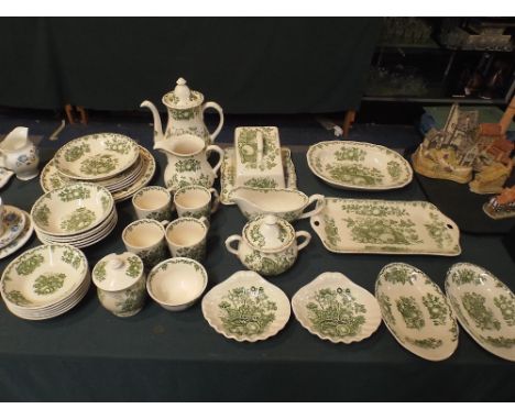 A Collection of Masons Fruit Basket China to Include, Bowls, Plates, Cheese Dish, Mugs, Coffee Pot, Jug etc