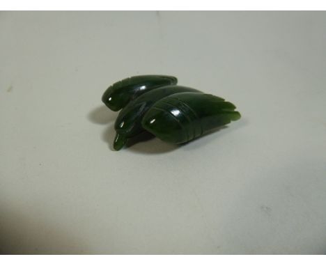 A Carved Spinach Jade Study of an Eagle in Flight, 6cm Long